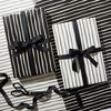 image:imageThe Gift Wrap Company 58189227 Party Animals Flat Gift Wrapping Paper Sheet Set 30 x 23 Multicolor 3 PiecesStriped Black and Crme